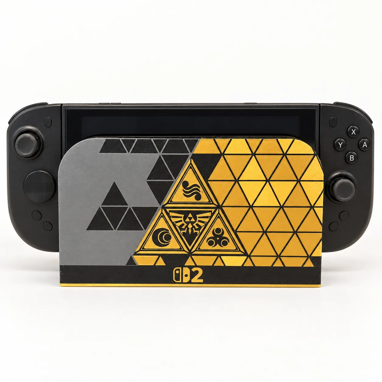 Cover para el dock de Nintendo Switch 2 inspirado en The Legend of Zelda, con la Trifuerza en dorado y gris, impreso en 3D