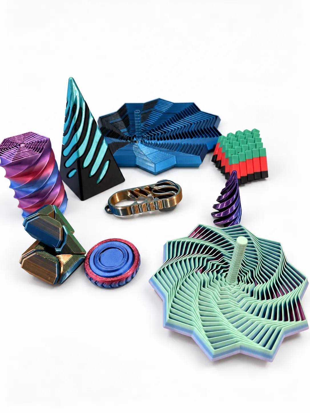 Colección de juguetes sensoriales impresos en 3D: espirales, pirámides, estrellas concéntricas, llaveros y rejillas flexibles