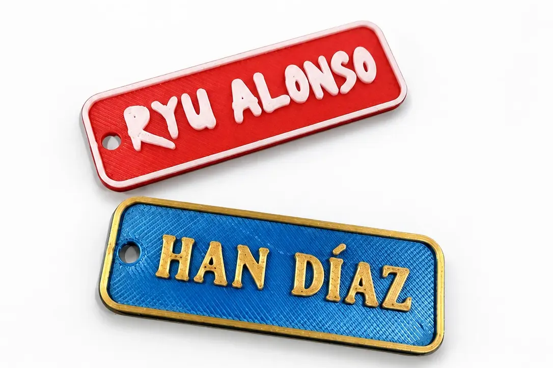 Mini etiquetas para estuche con los nombres Ryu Alonso en rojo estilo Naruto y Han Díaz en azul y dorado estilo Zelda